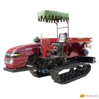 crawler type Muck spreader for spreading solid manure and fertilizer